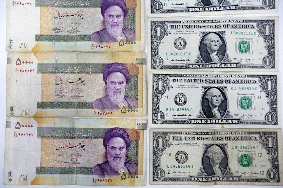 Iran’s currency hits new record low against the dollar