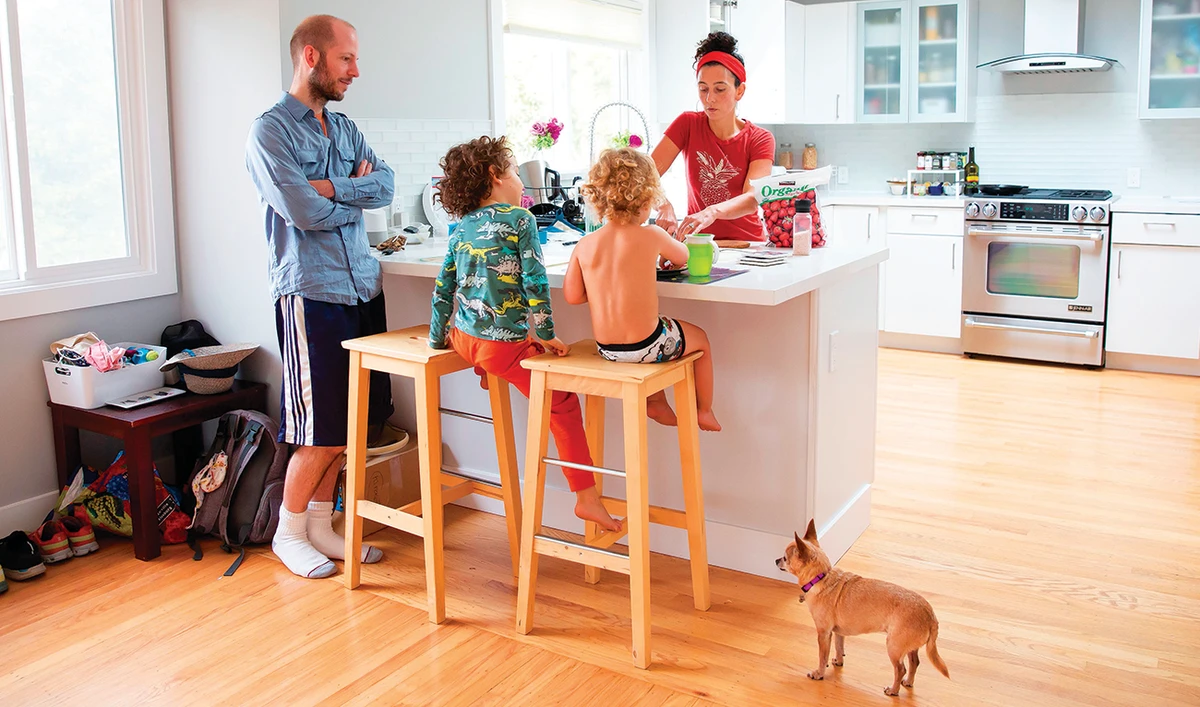 Kyala Brown, right, and her family have lunch at their new home in El Cerrito, California. Brown’s family previously lived in San Francisco. (AFP)