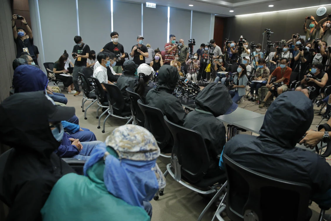 Relatives of 12 Hong Kong activists detained at sea by Chinese authorities call for their family members’ return to the territory on Sept. 12, 2020. (AP)