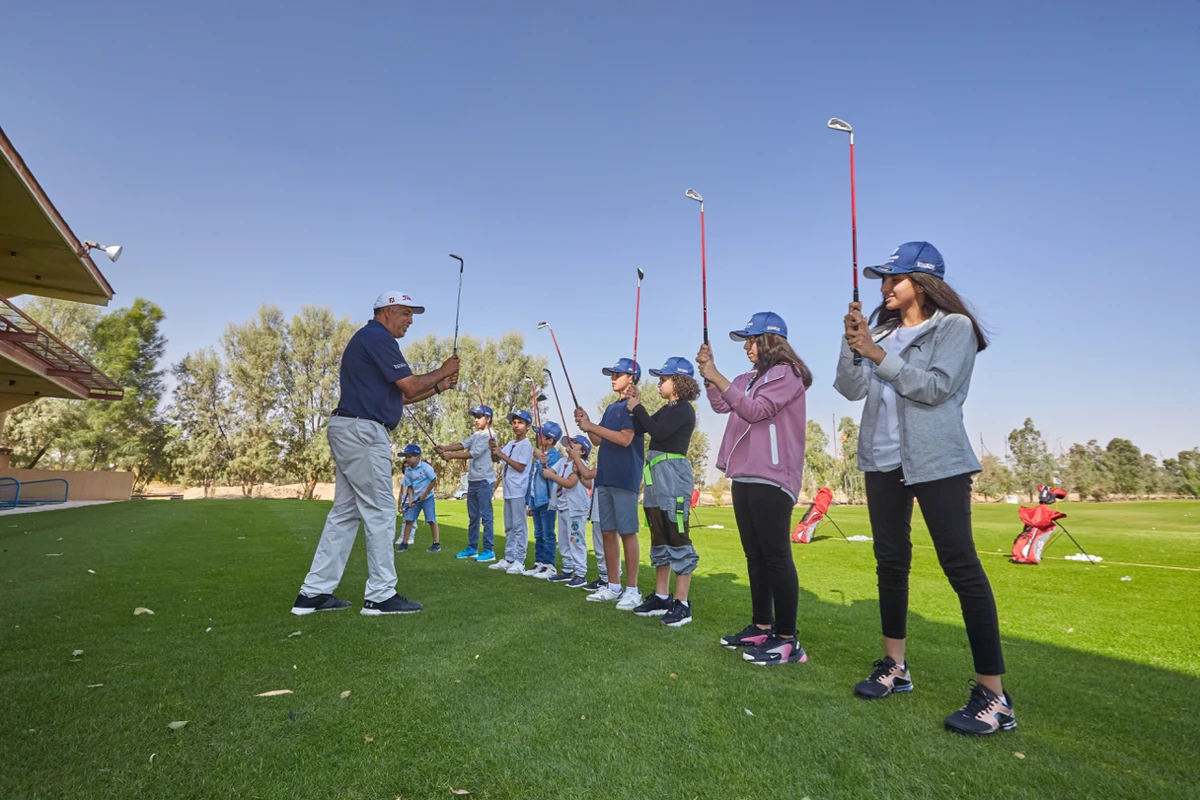 Saudi school children during a golf clinic with SGF Mass Participation official Bouchaib El Jadiani. (Supplied)