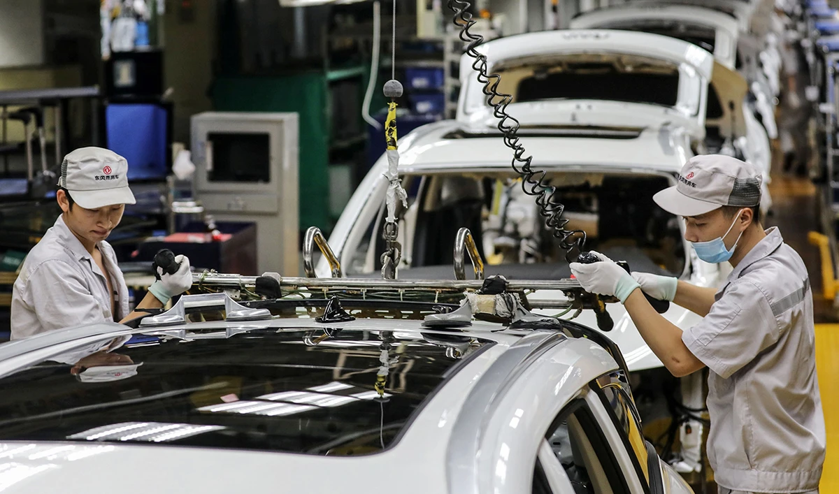 China’s factory output quickens as retail sales surge