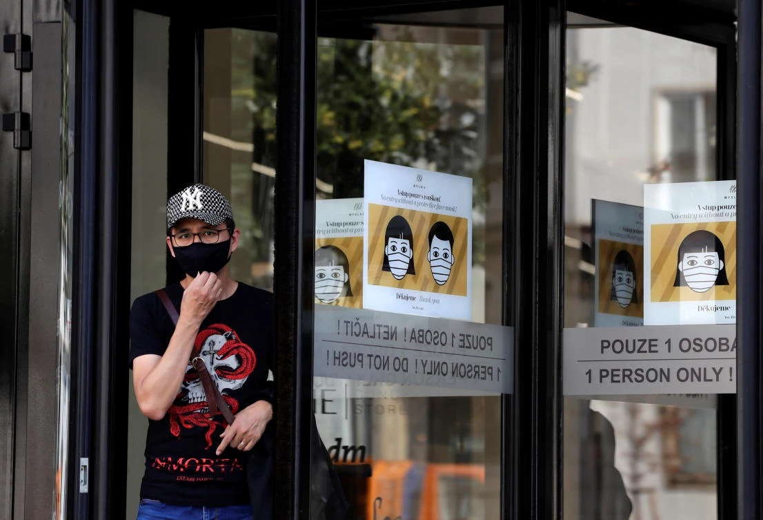 A man wearing a face mask leaves a shopping mall as the spread of the coronavirus disease (COVID-19) continues in Prague, Czech Republic, September 14, 2020. (Reuters)