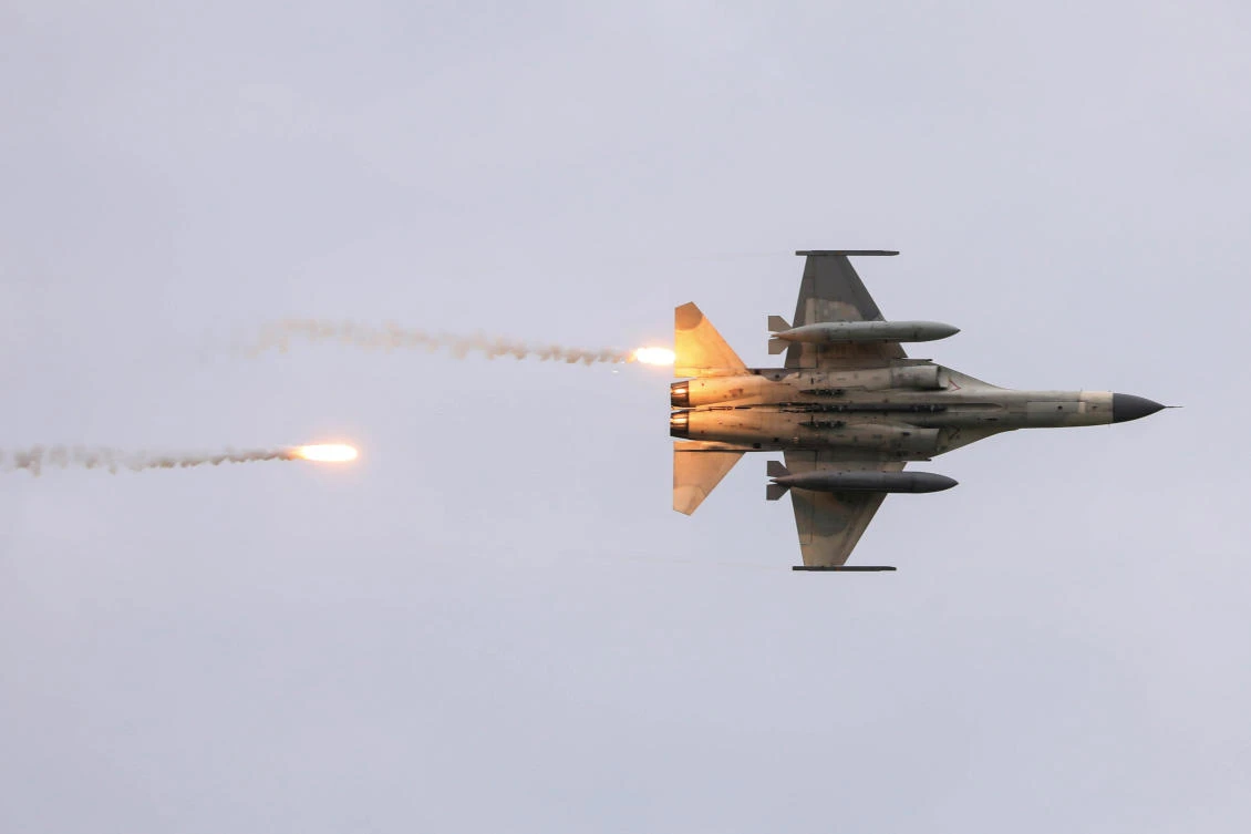 Above, one of the domestically built Indigenous Defense Fighters takes part in the live-fire, anti-landing Han Kuang military exercise in Taichung, Taiwan on July 16, 2020. (Reuters)