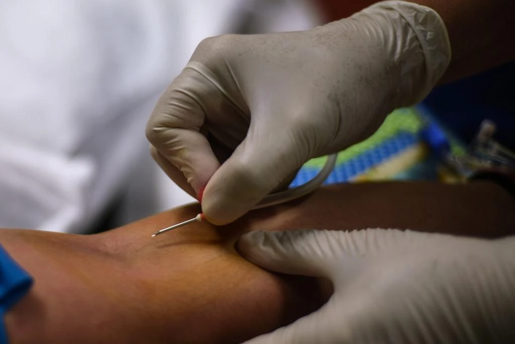 Healthcare workers from the Philippines are on the front lines of the pandemic at hospitals in the US, Europe and the Middle East as well as at home. (AFP file photo)