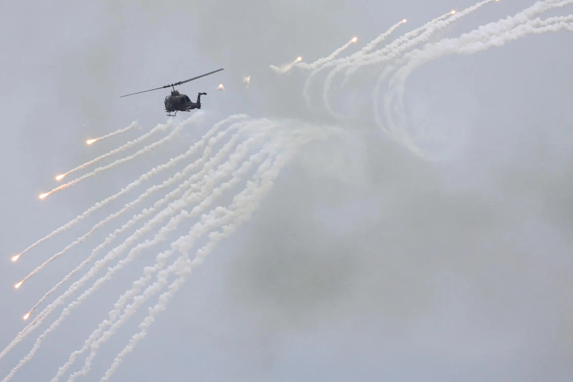 Above, a Taiwanese AH-1 Cobra helicopter during the live-fire, anti-landing Han Kuang military exercise, which simulates an enemy invasion, in Taichung on July 16, 2020. (Reuters)