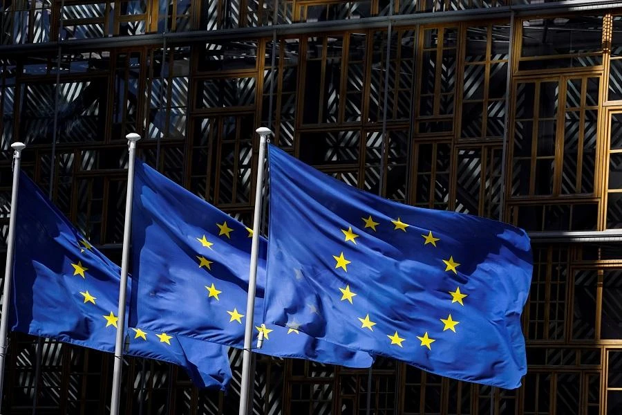 A picture taken on May 28 in Brussels shows the European Union flags fluttering in the aire outside the European Commission building in Brussels. (File/AFP)