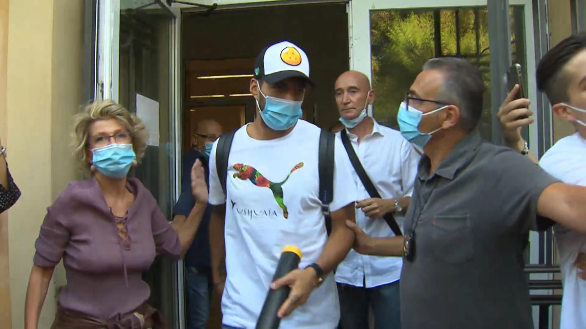 Uruguayan striker Luis Suarez leaves the University for Foreigners after taking an Italian citizenship test, Perugia, Italy, September 17, 2020. (Reuters)
