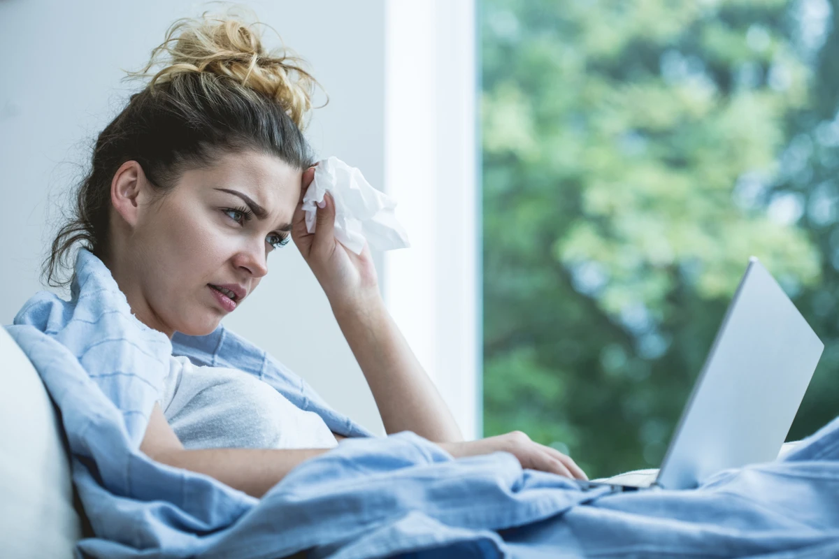 Research conducted by Public Health England (PHE) found that those with flu and COVID-19 were 2.27 times more likely to die than those who just had COVID-19. (Getty Images)