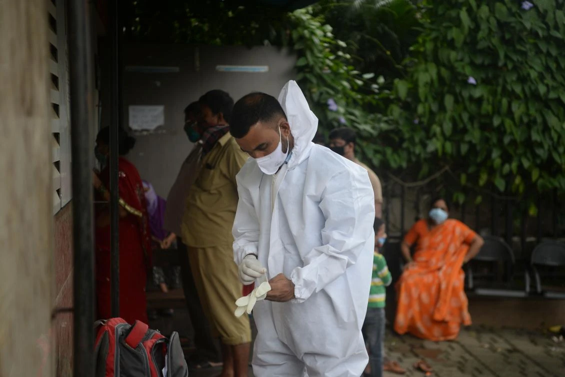 A health worker gets ready to conduct Covid-19 Coronavirus swabs in Mumbai on September 25, 2020. (AFP)
