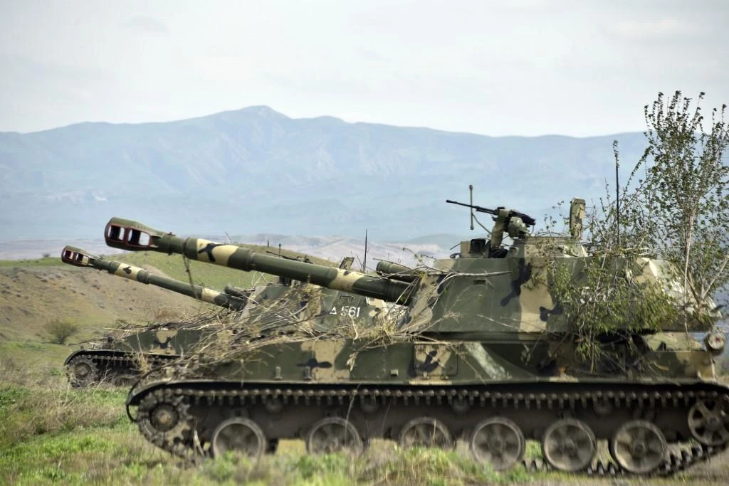 Mobile artillery units of the self-defence army of Nagorno-Karabakh hold a position outside the settlement of Hadrut. (File/AFP)