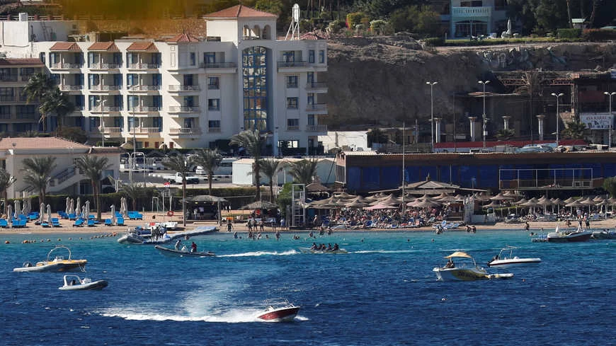 Tourists enjoy the water on a beach at the Red Sea resort of Sharm el-Sheikh, Egypt, Dec. 15, 2018. (Reuters)