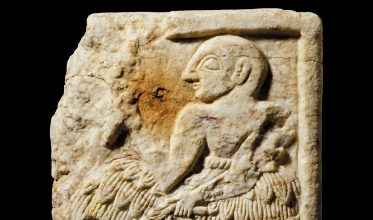 A handout picture released by the British Museum in London on 28 September 2020 shows a Sumerian plaque, dating to around 2400BC, and belonging to the Early Dynastic III period of southern Iraq, that was smuggled out of Iraq and then seized from an online auction site by the UK authorities. (Reuters)