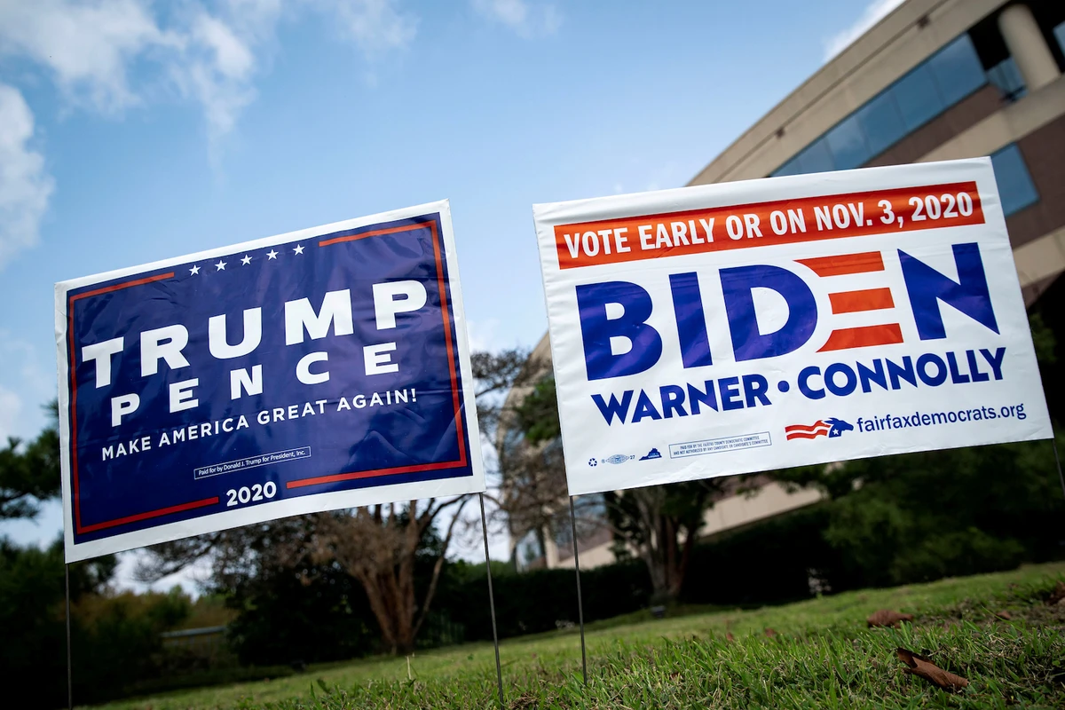 Yard signs supporting Trump and Biden are seen outside of an early voting site at the Fairfax County Government Center in Virginia, US. (File/Reuters)