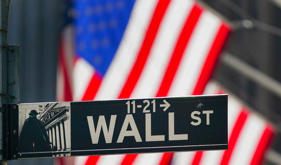 In this Wednesday, Oct. 14, 2020 file photo, the American Flag hangs outside the New York Stock Exchange in New York. (AP)