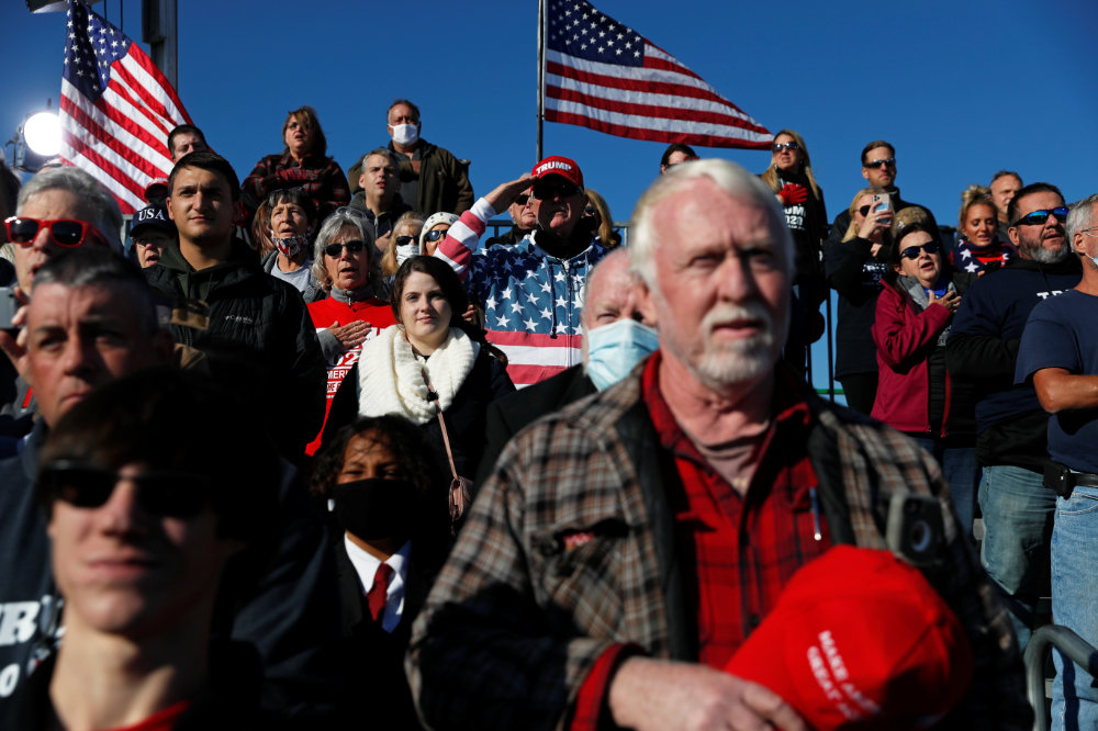 Maskless supporters of US President Donald Trump gather for a Trump re-election campaign rally in Butler, Pennsylvania, October 30, 2020. (REUTERS/Shannon Stapleton)
