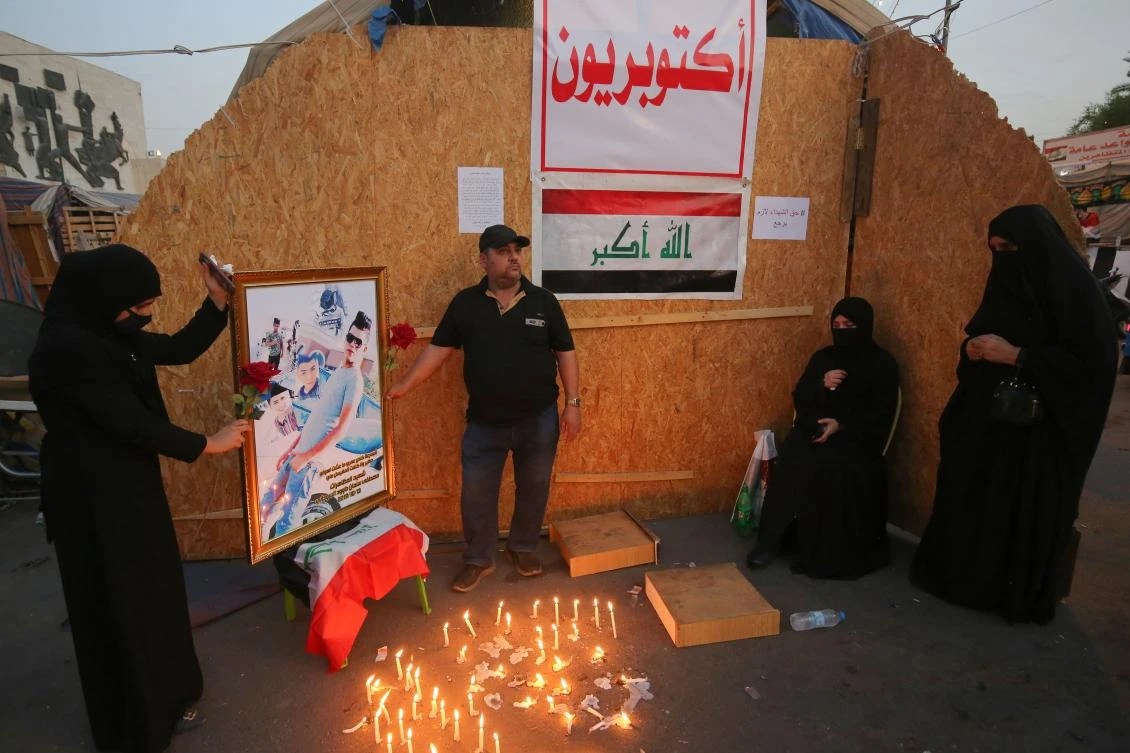 Iraqis gather in Baghdad to mark anti-government protests anniversary