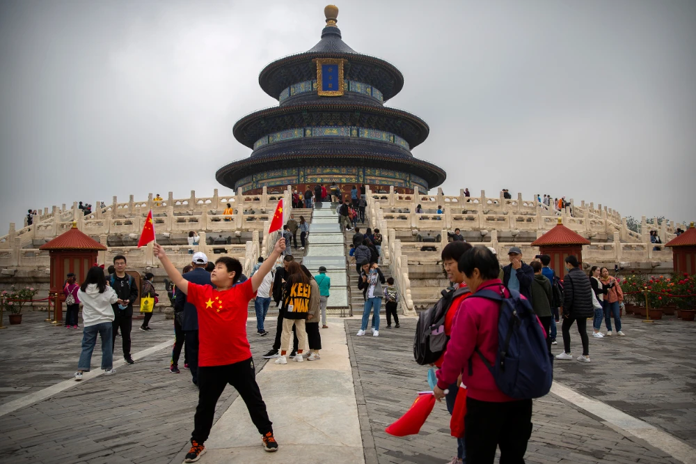 The eight-day holiday this year, which coincides with the Mid-Autumn Festival, will be a litmus test of whether China’s tourism industry can bounce back. (AP)
