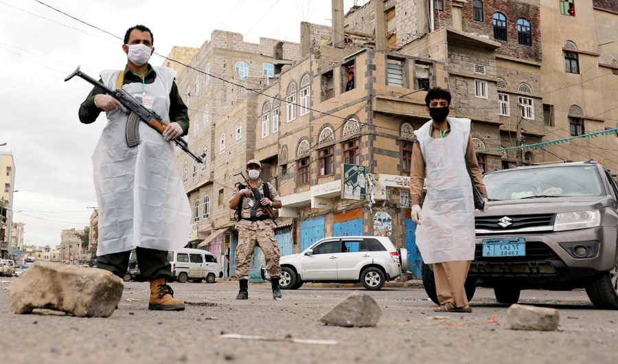 Security men stand guard in Sanaa, Yemen May 6, 2020. (REUTERS)