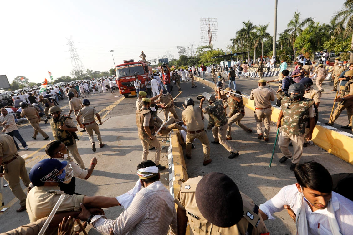Police officers disperse demonstrators during a protest after the death of a rape victim, in Noida, India, October 3, 2020. (Reuters)