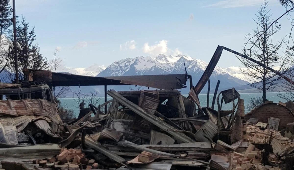 This handout photo taken and released on October 5, 2020 courtesy of Gary Kircher shows damage caused by the South Island wildfires in Lake Ohau. (AFP)