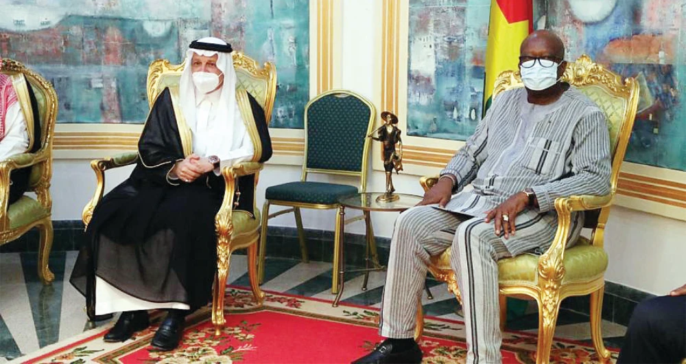 The Saudi minister of state for African affairs, Ahmed bin Abdul Aziz Qattan, and Burkina Faso’s President Roch Marc Christian Kabore, during the event. (SPA)