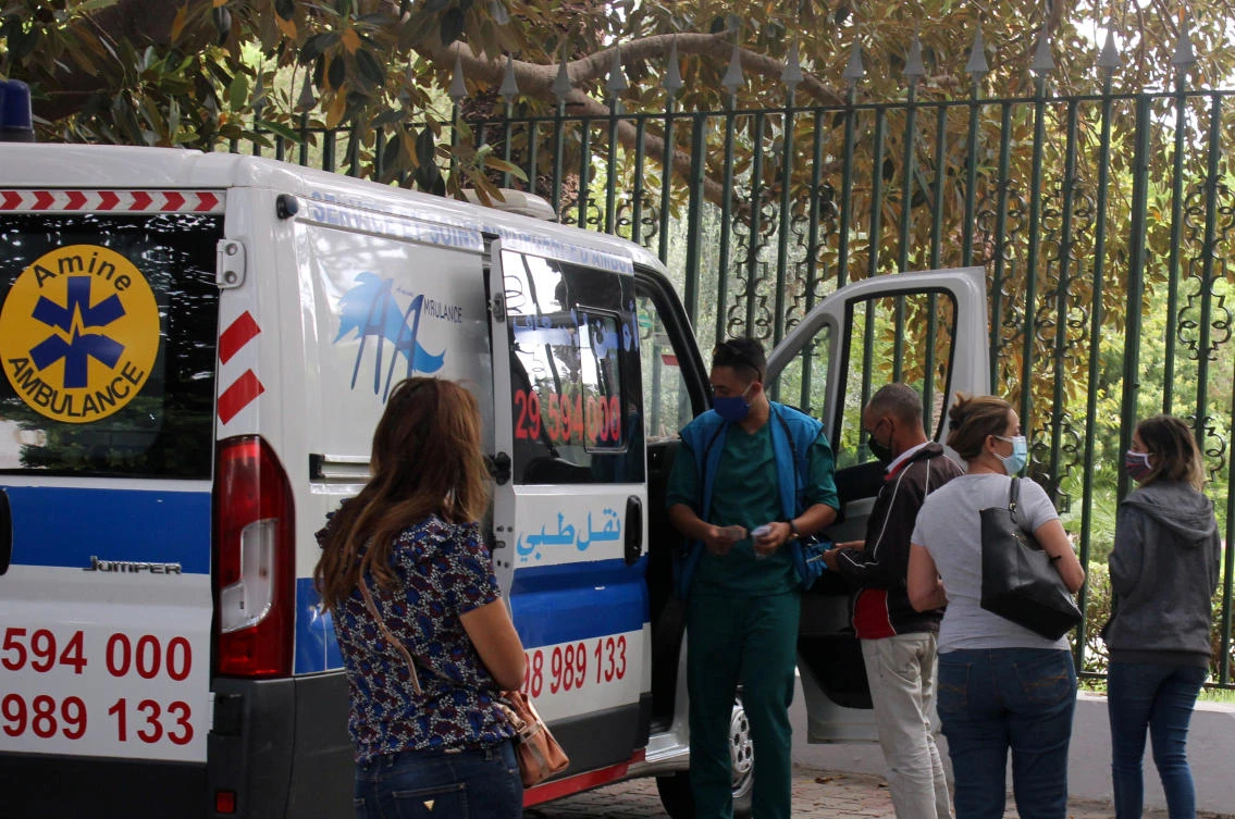 People wait to get tested for the coronavirus disease (COVID-19), outside a mobile testing lab in Tunis, Tunisia October 7, 2020. (Reuters)