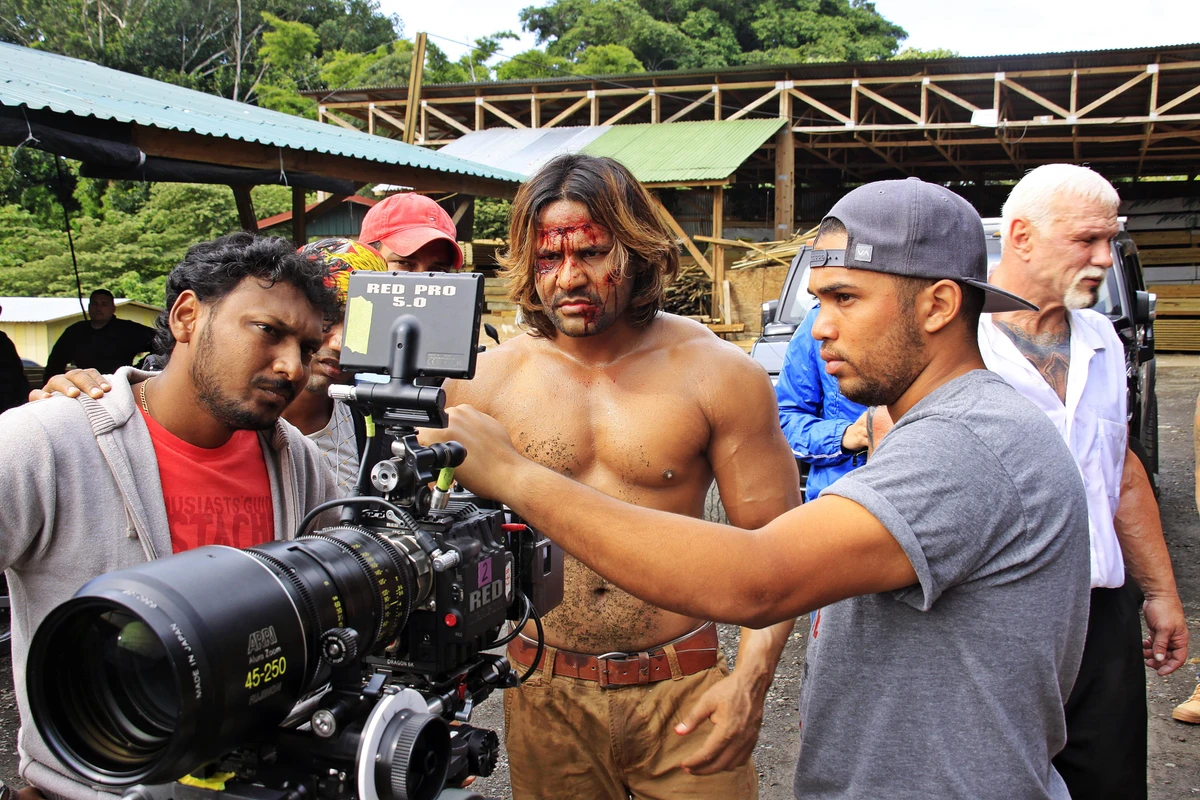 Undated handout picture released by Pacific Investment Corporation showing Indian actor Prabhakar Sharan (C) during the shooting of a scene of the first traditional Bollywood style film shoot in Latin America in San Jose, Costa Rica. (AFP)