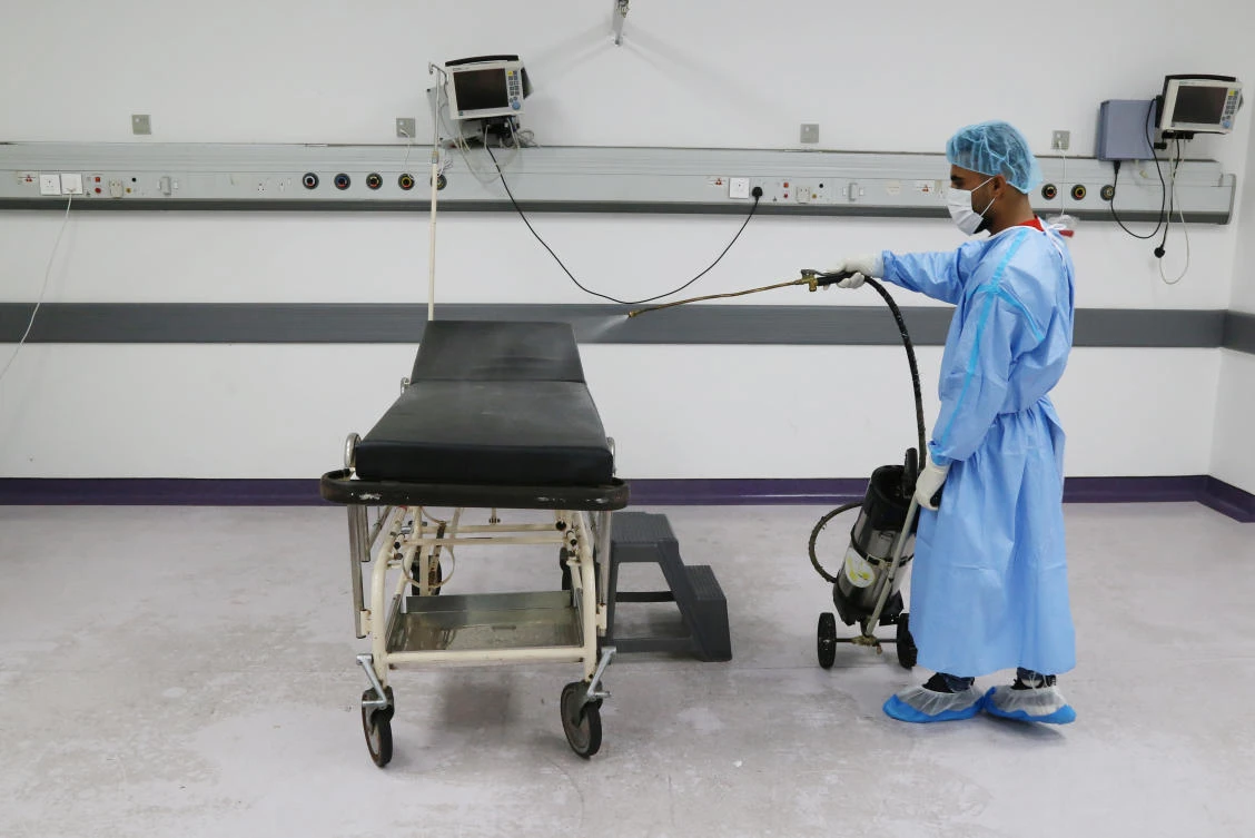 A worker disinfects a room where patients undergo tests for the coronavirus disease (COVID-19), at Rafik Hariri University Hospital in Beirut, Lebanon. (File/Reuters)