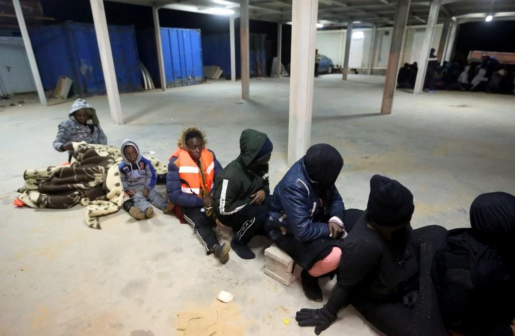 A Libyan armed group is holding hostage at least 60 migrants in “appalling” conditions after abducting them, MSF said. (File/AFP)