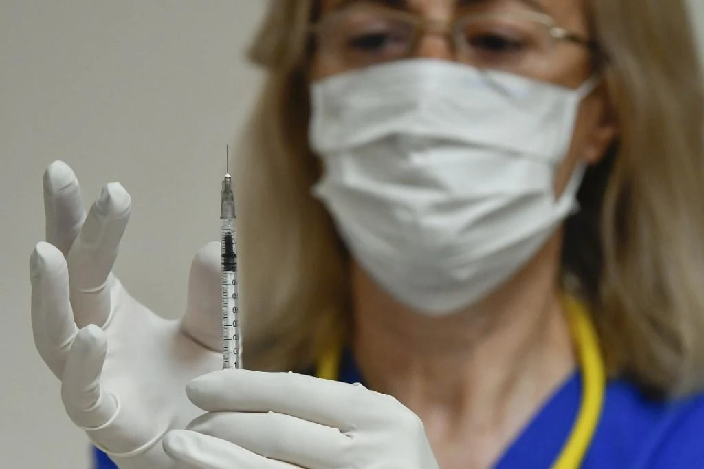 The widely used BCG tuberculosis vaccine will be tested on frontline care workers in Britain for its effectiveness against COVID-19. (File/AFP)
