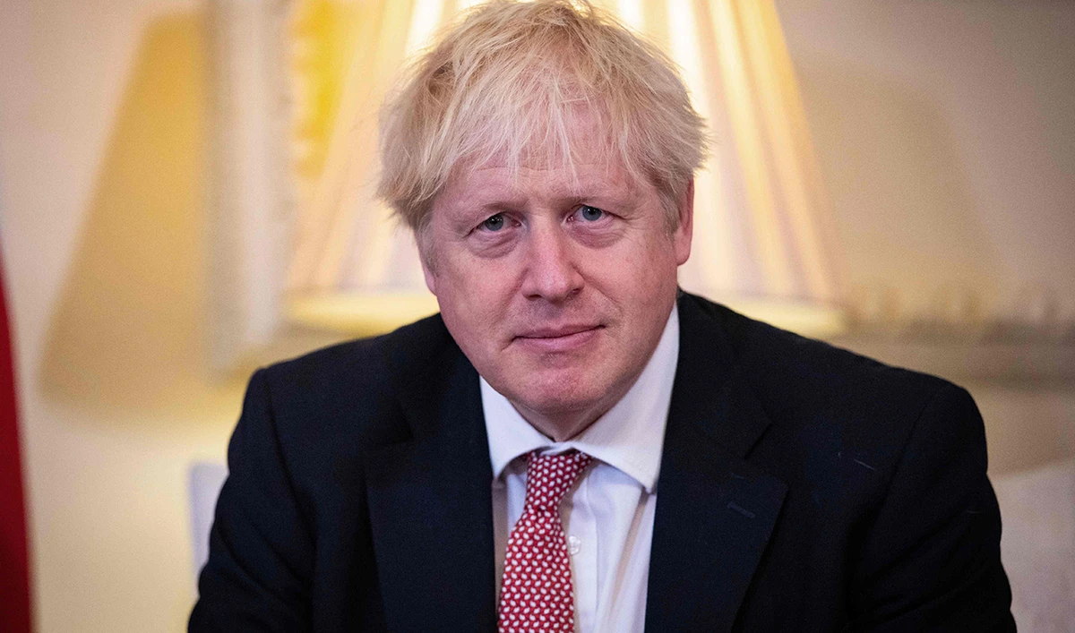 British PM Boris Johnson is reluctant to impose a national lockdown. (AFP)