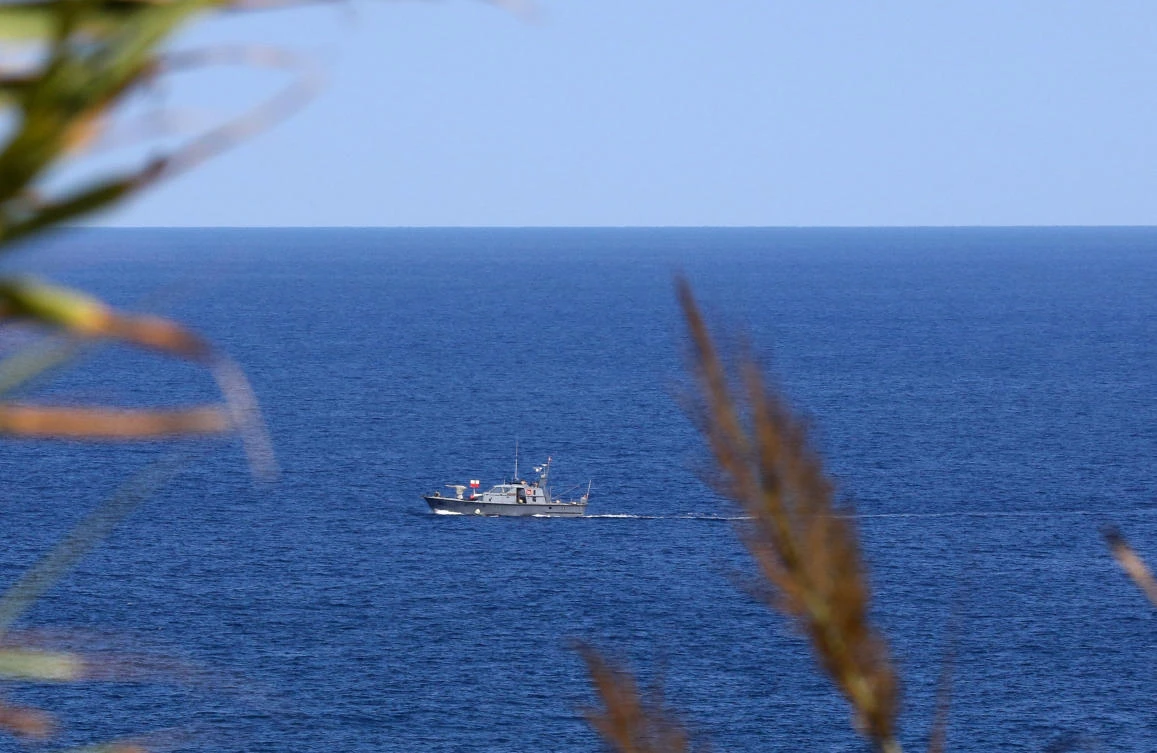 Above, a Lebanese military vessel patrols the waters off the coast of the southern area of Naqura by the border with Israel on Oct. 11, 2020. (AFP)