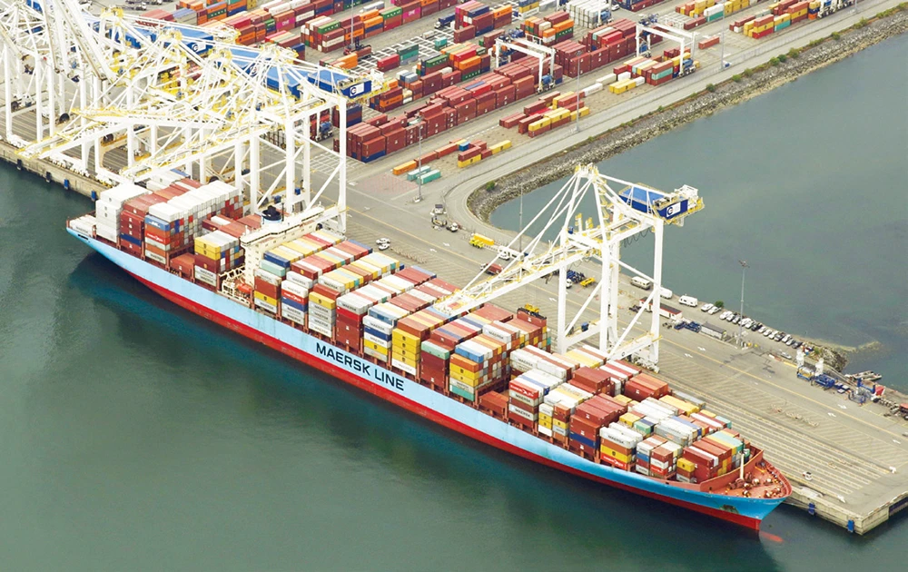 Maersk plans lay off 2,000 in business shake-up, boosts outlook amid growing freight demand