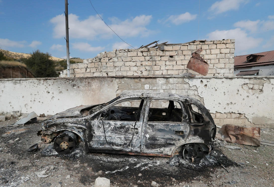 A burnt car is seen outside a hospital, which, according to the Ministry of Foreign Affairs of the Nagorno-Karabakh region, was damaged during recent shelling by Azeri armed forces in Martakert. (Reuters)