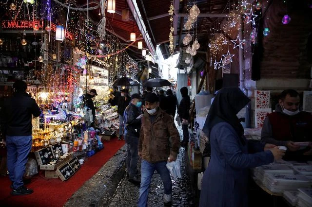 People wear protective face masks due to coronavirus concerns in Turkey. (Reuters)