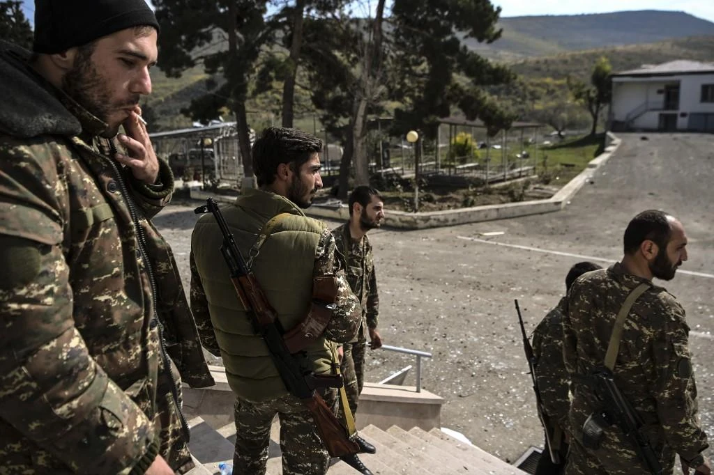 Armenian soldiers stand at a military hospital in the Martakert region following an overnight fighting between Armenia and Azerbaijan over the disputed region of Nagorno-Karabakh on October 15, 2020. (File/AFP)