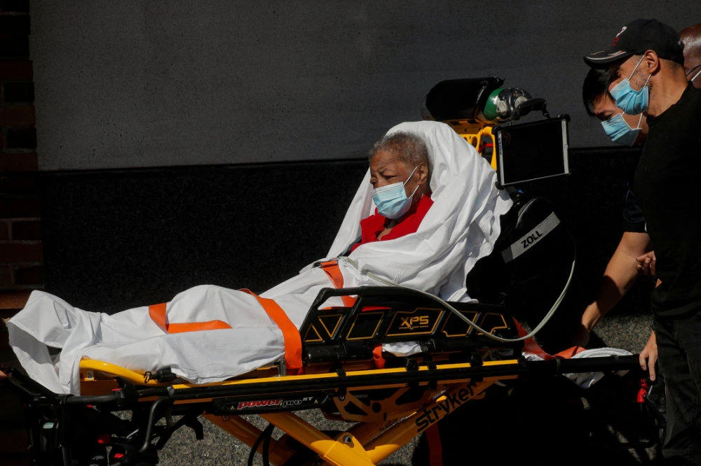 A patient arrives on Oct. 14, 2020 at the Emergency entrance to Maimonides Medical Center in the Borough Park neighborhood of Brooklyn, New York, as the spread of COVID-19 continues. (REUTERS/Brendan McDermid/File Photo)