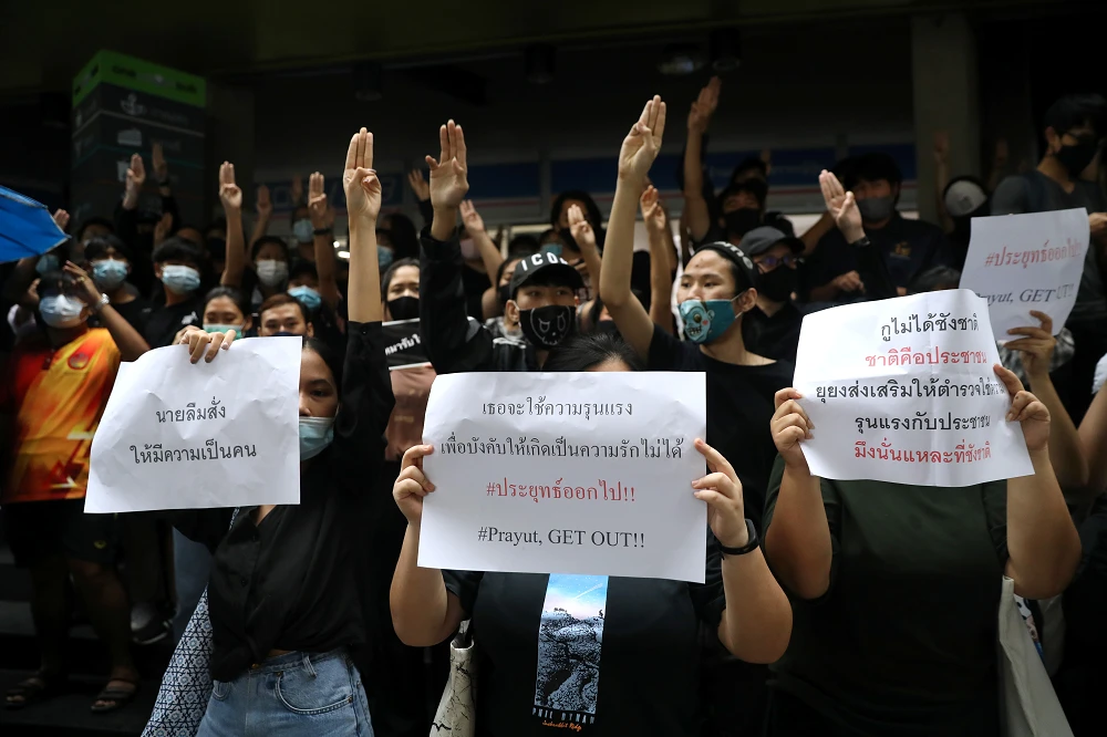 Pro-democracy protesters show the three-finger salute during an anti-government protest at Udom Suk station in Bangkok Oct. 17, 2020. (Reuters)