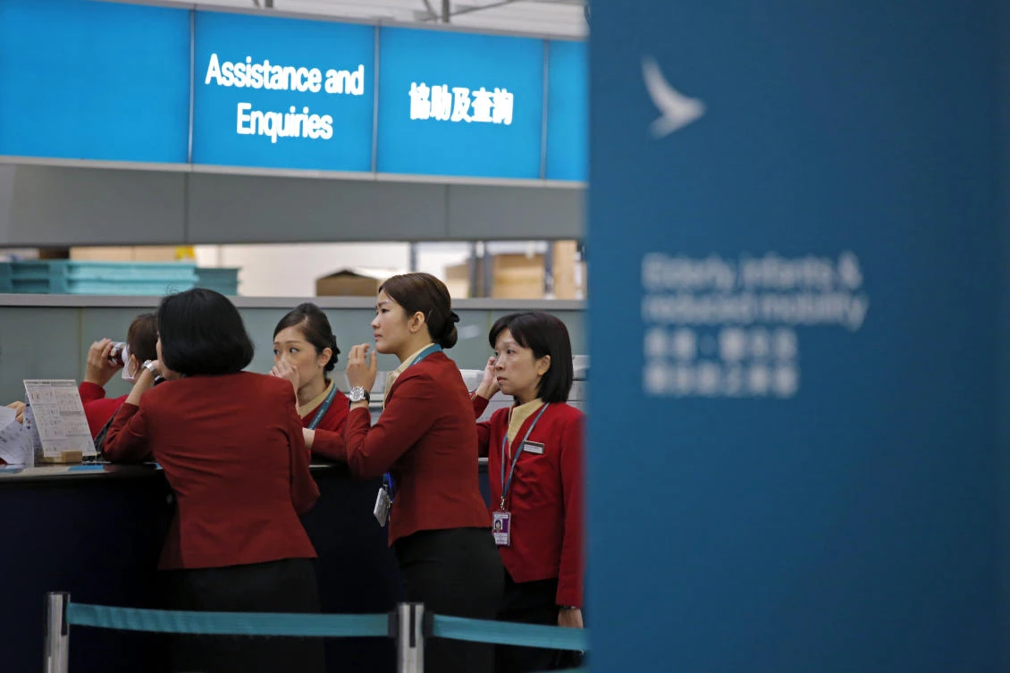 Cathay Pacific to slash workforce, end Cathay Dragon brand due to pandemic