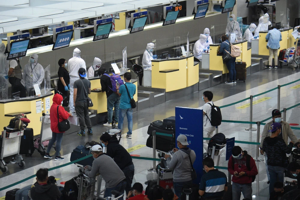 Virus fears see Filipinos shun foreign travel despite lifting of ban