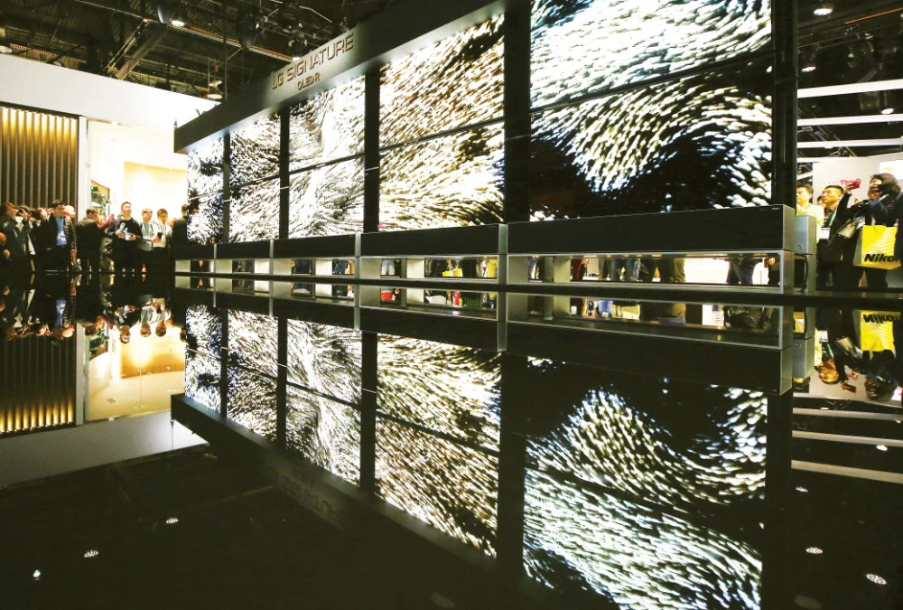 LG Signature OLED R rollable televisions on show at the Las Vegas Convention Center. The TVs helped deliver a third-quarter earnings boost for the company. (AFP)