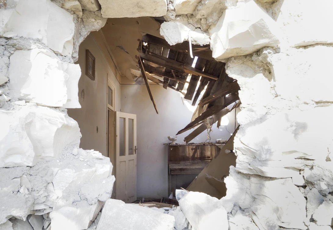 An apartment through a shell-pierced wall after shelling by Azerbaijan's artillery during a military conflict in the town of Martuni, the separatist region of Nagorno-Karabakh, Friday, Oct. 23, 2020. (AP)