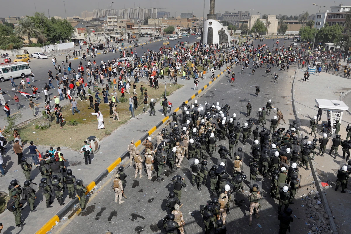 Iraqi forces use water cannon, tear gas against protesters in Baghdad