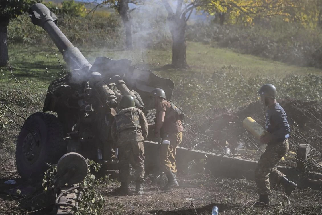 Armenian soldiers fire artillery toward Azerbaijani forces over the breakaway region of Nagorno-Karabakh. (AFP)