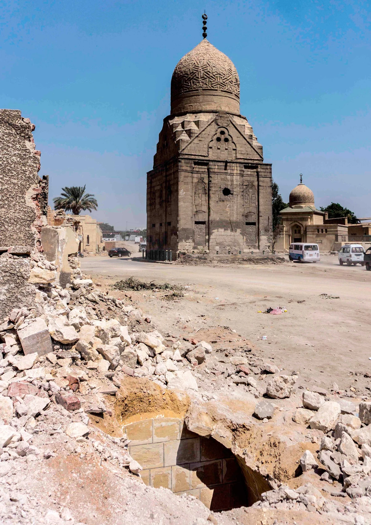 This photo taken on July 26, 2020 shows the derelict dome of the Mamluk Sultan Abu Said al-Zahir Qansuh al-Ashrafi (AD 1498-1500) amidst ongoing roadworks at the historic City of the Dead necropolis of Egypt's capital Cairo. (AFP)