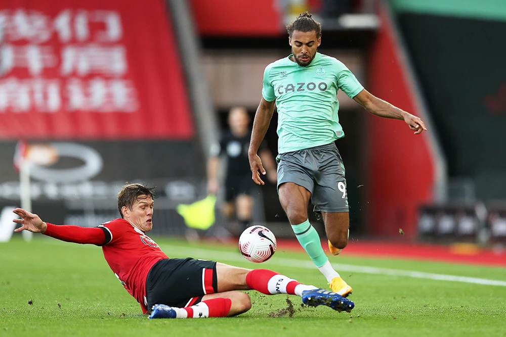 Jannik Vestergaard and Everton’s Dominic Calvert-Lewin during their match on Sunday. Southampton ended Everton’s unbeaten start to the season. (Reuters)