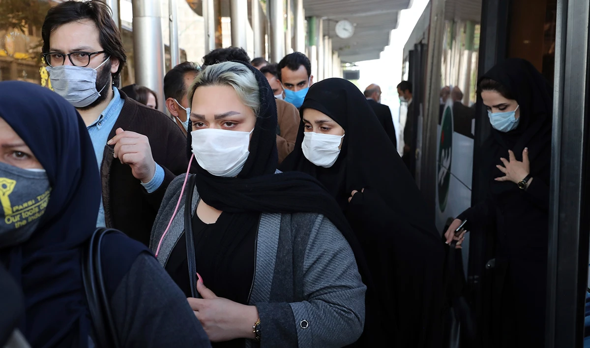 People wear protective face masks to help prevent the spread of the coronavirus in downtown Tehran, Iran. (AP/File)