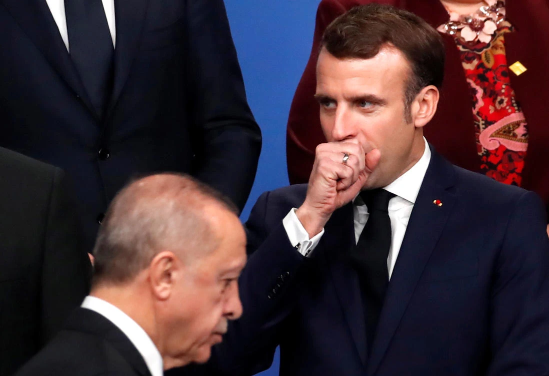 Macron next to Turkey's President Recep Tayyip Erdogan at the NATO leaders summit in Britain last year. (Reuters/File)