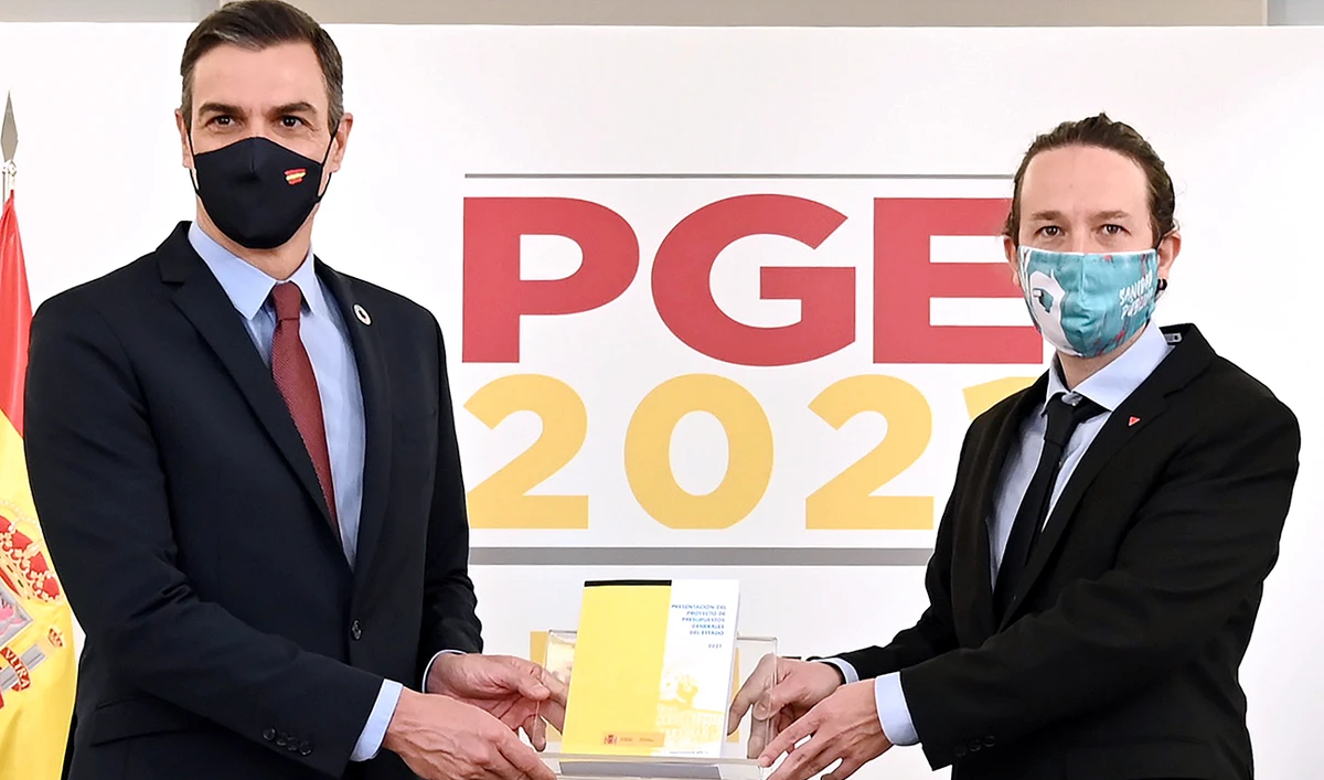 Spanish Prime Minister Pedro Sanchez and Deputy Prime Minister for Social Rights and Sustainable Development Pablo Iglesias present the government’s budget plan for 2021 in Madrid. (AFP)