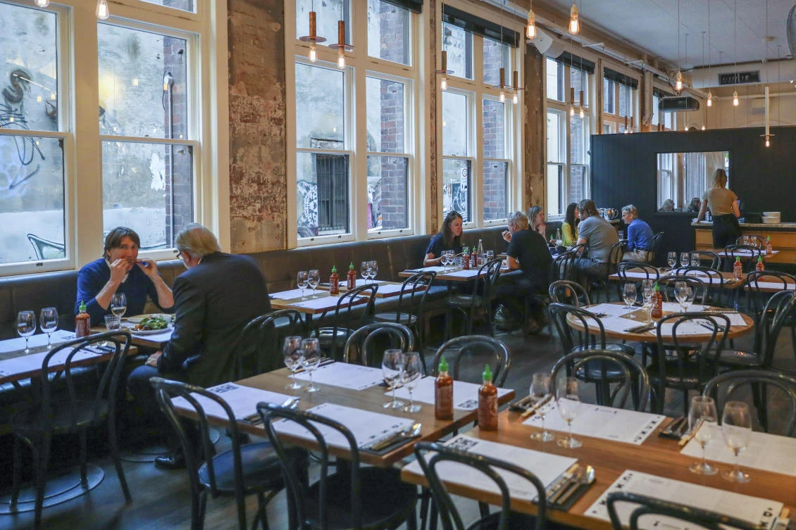 Above, diners at the popular Melbourne restaurant Chin Chin on Wednesday, Oct. 28, 2020 after restaurants, cafes and bars were allowed to open and outdoor contact sports resumed. (AP)